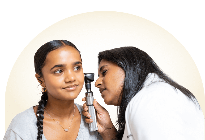 doctor examing patient's ear 