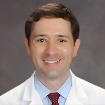 Headshot of Andrew Courson 