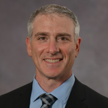 Headshot of Eric Munzer