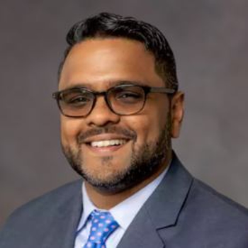 Headshot of John Kuryan