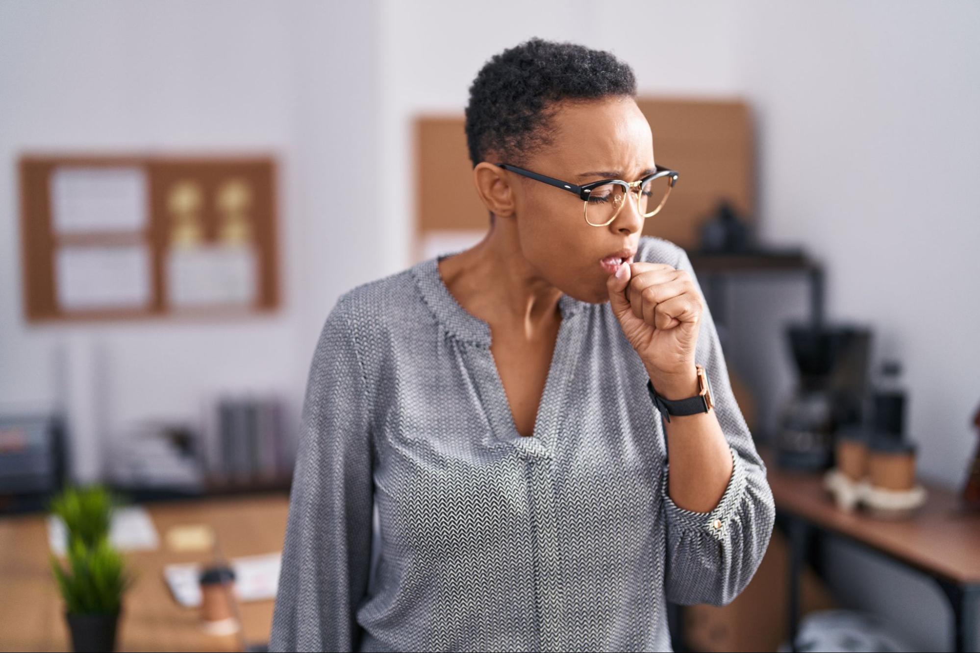 A woman coughing
